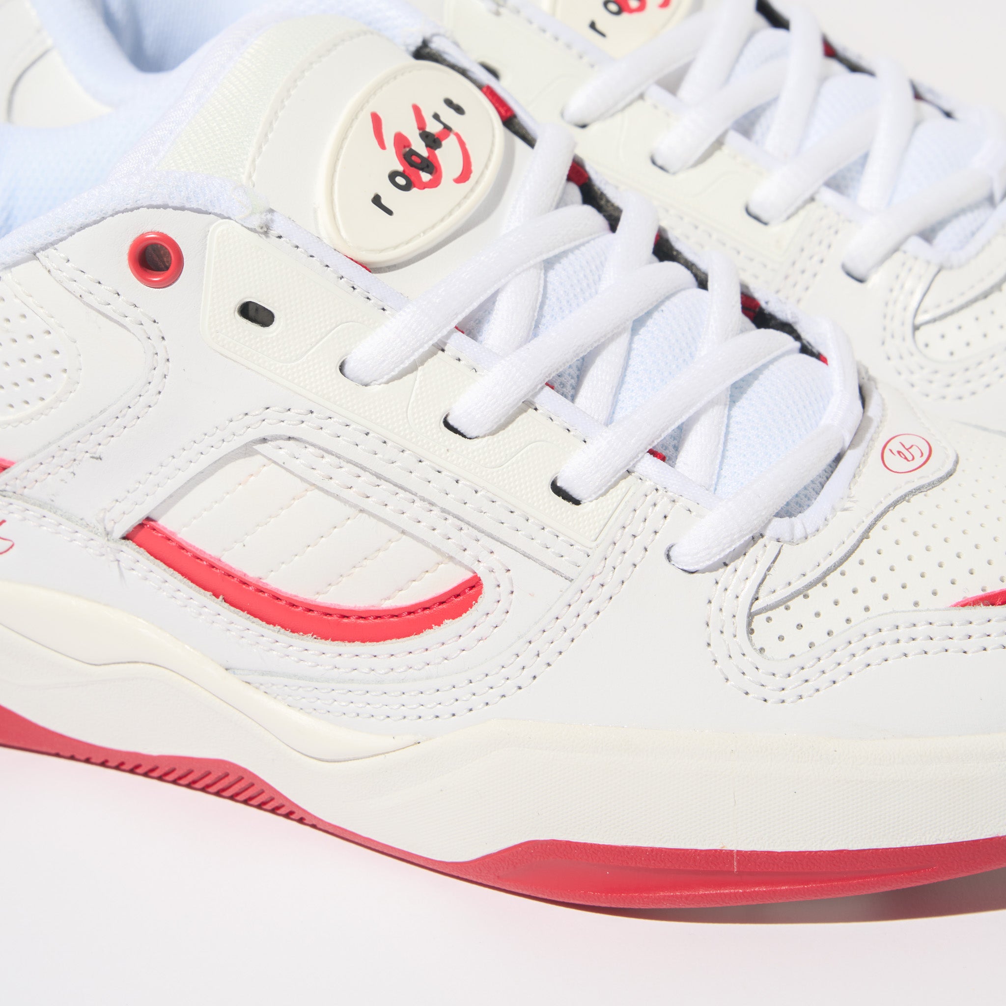 éS TJ Rogers Pro Model Shoe White and Red Details Close Up