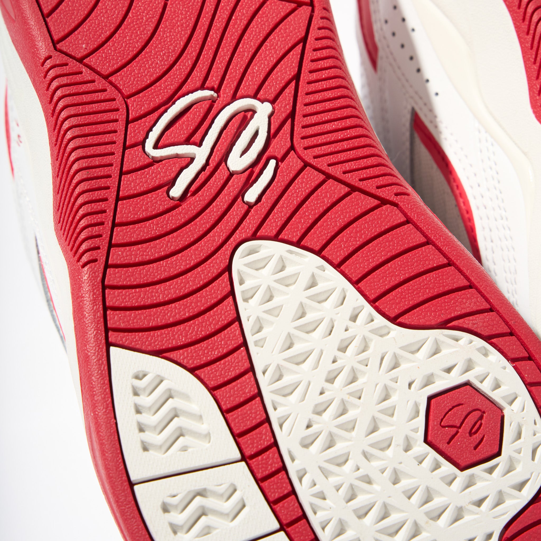 éS TJ Rogers Pro Model Shoe White and Red Sole Close Ups